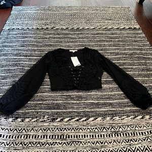 Size small black lace up puff sleeve crop NWT